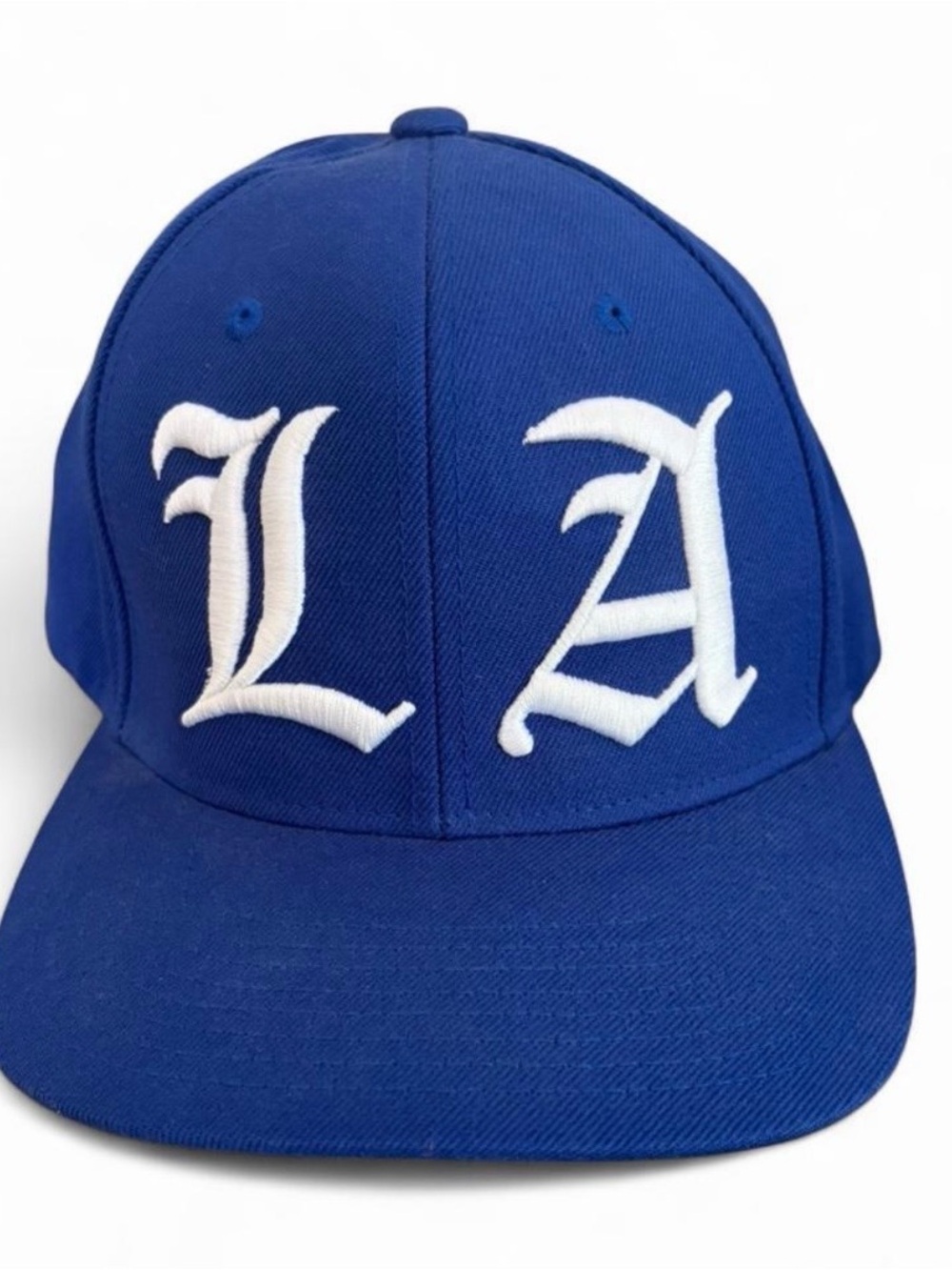 Starter brand LA Dodgers blue snapback hat.